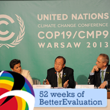 Three panelists talking at the COP19 conference