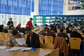 University students studying in a library