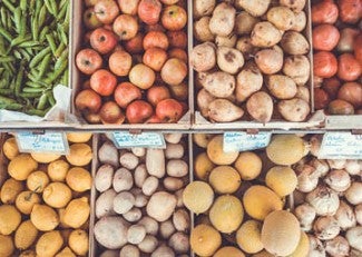 aerial view of boxes of fruits and vegetables in a market